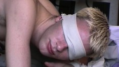 Cute blonde boy takes a dildo up his ass and gets his cock stroked